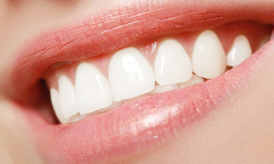 Closeup of smile receiving dental treatment