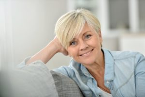 older woman blonde hair smiling