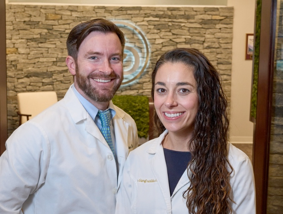 Wethersfield dentists Doctor Brendan Dolan and Doctor Riley Gionfriddo smiling